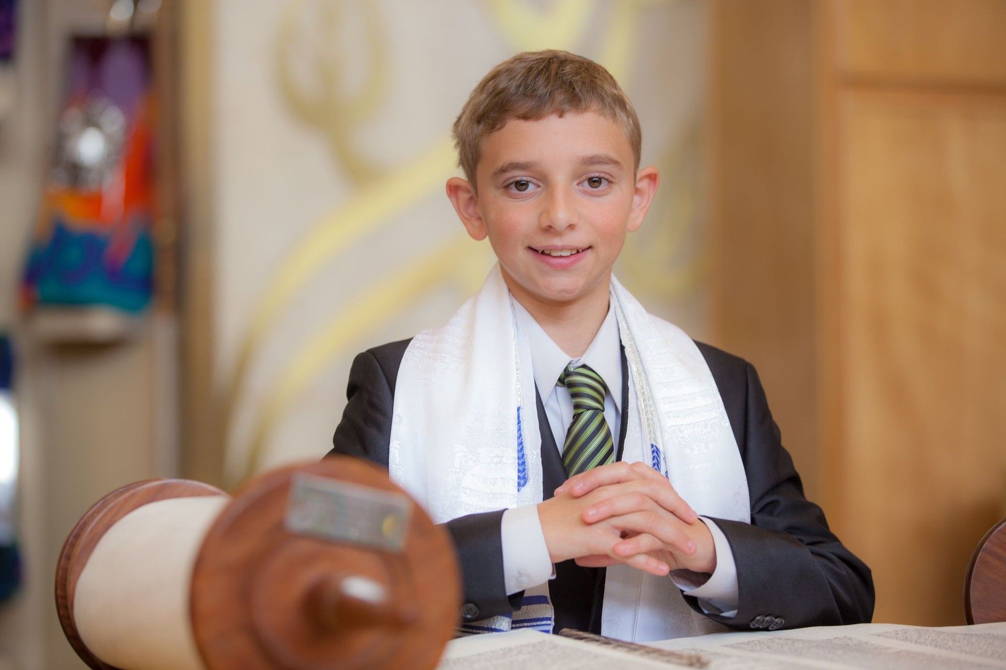 Bar mitzvah boy with grandparents