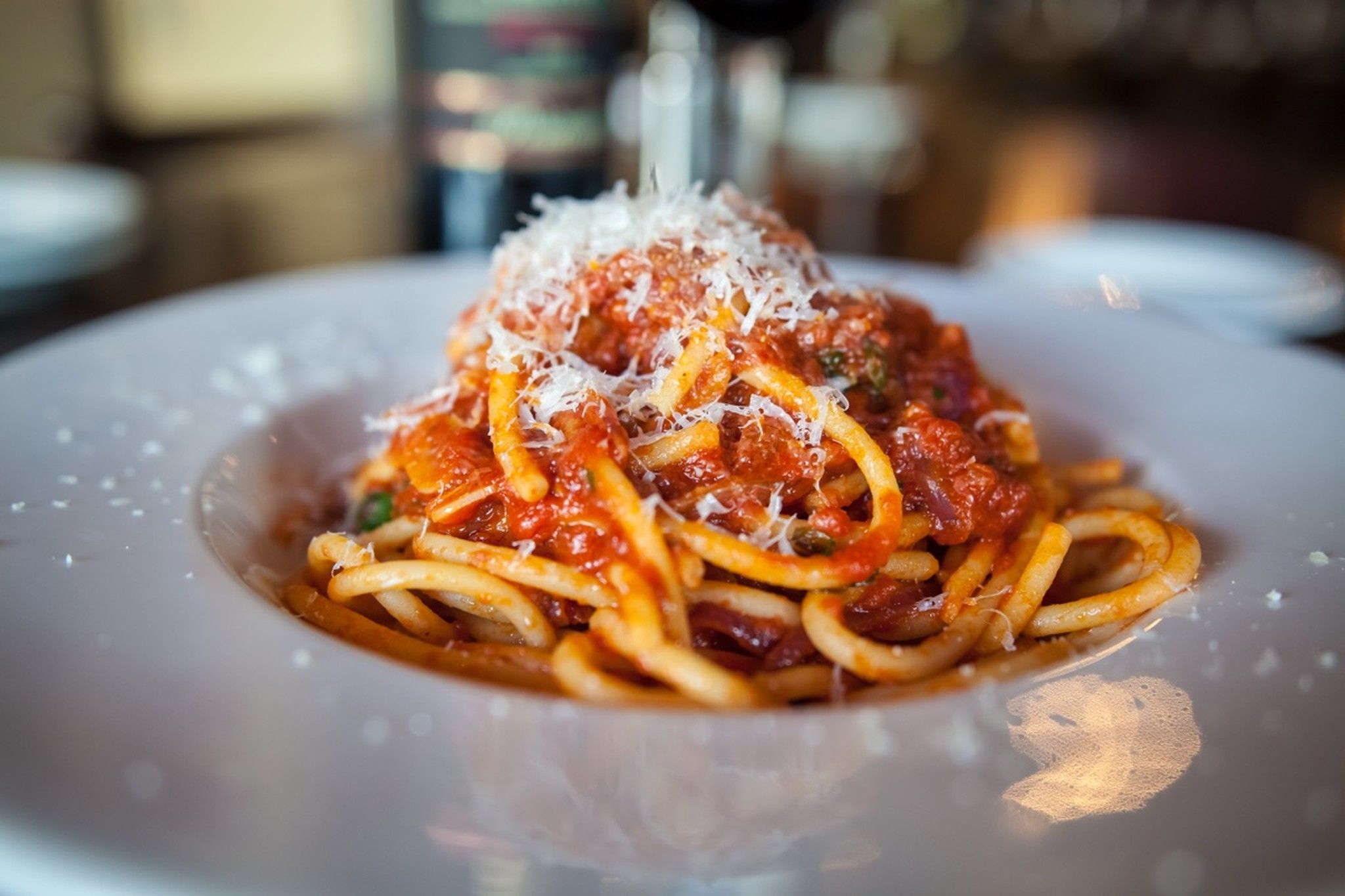 Spaghetti with tomato sauce and grated parmesan
