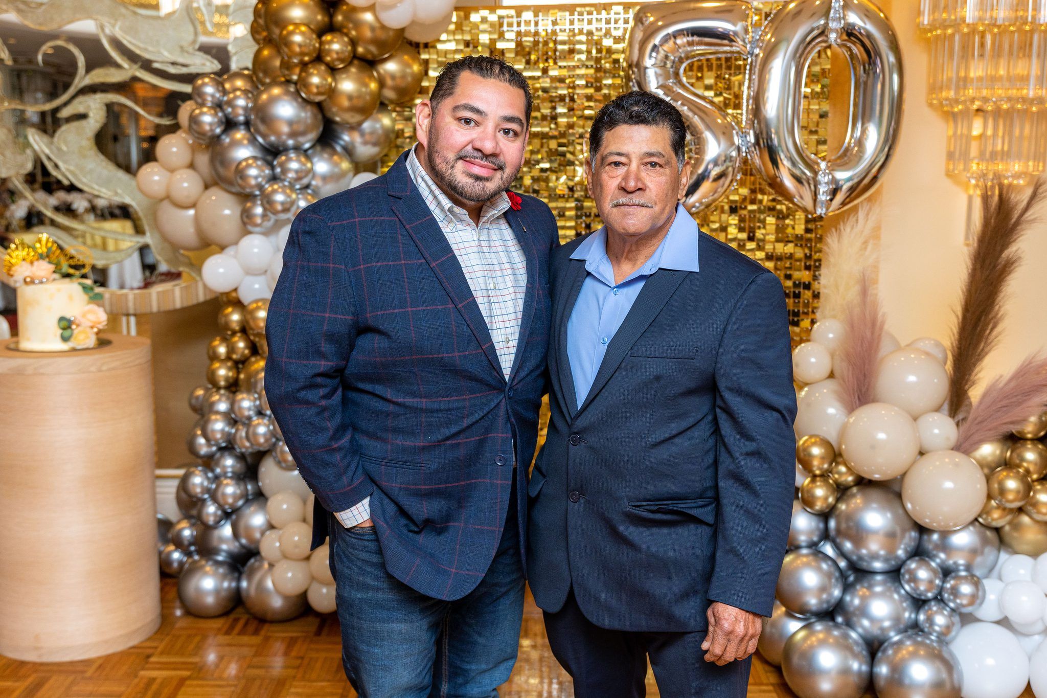 50th birthday celebration with gold and silver balloons