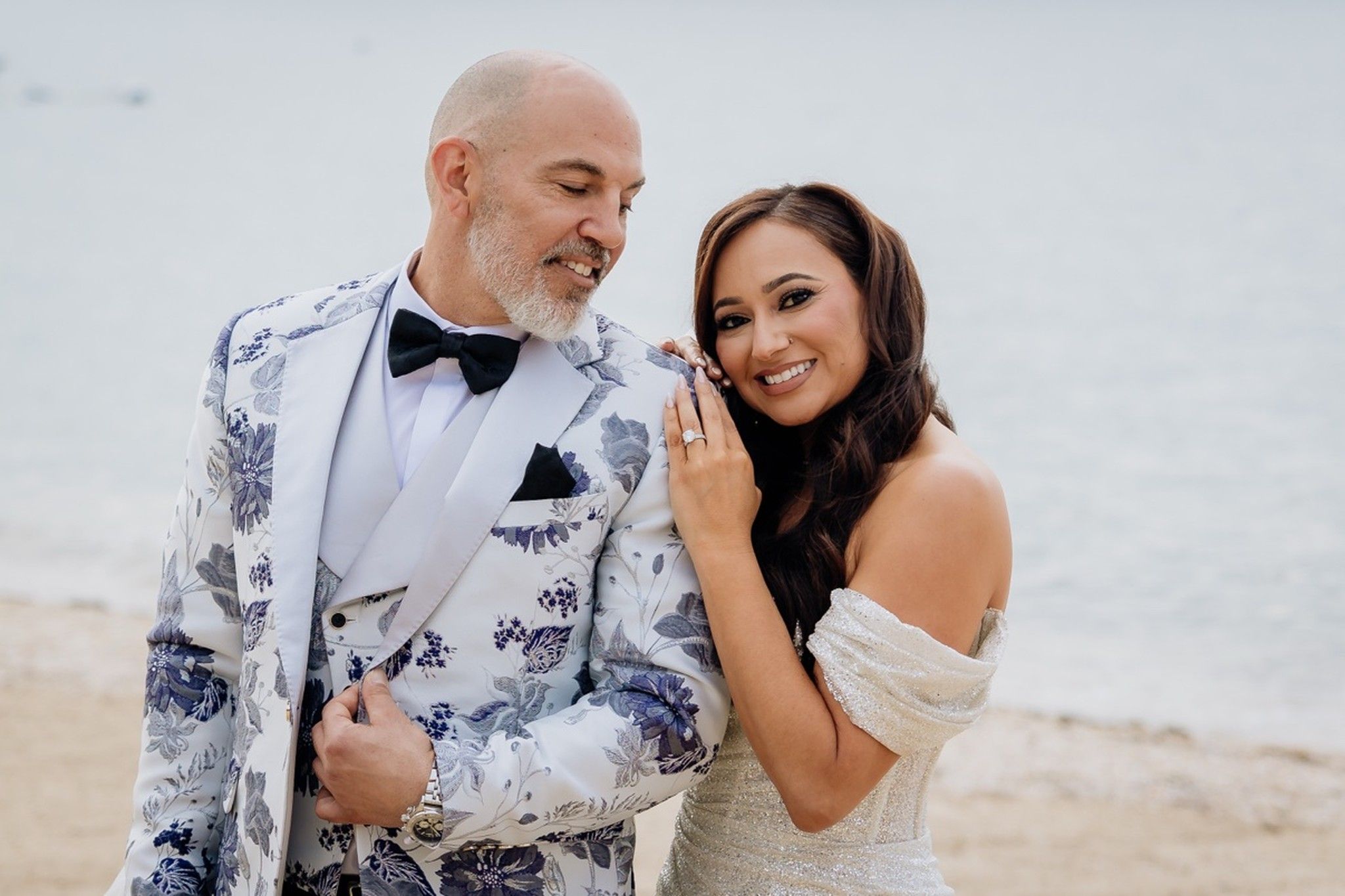 Beachside portrait of a newly married couple