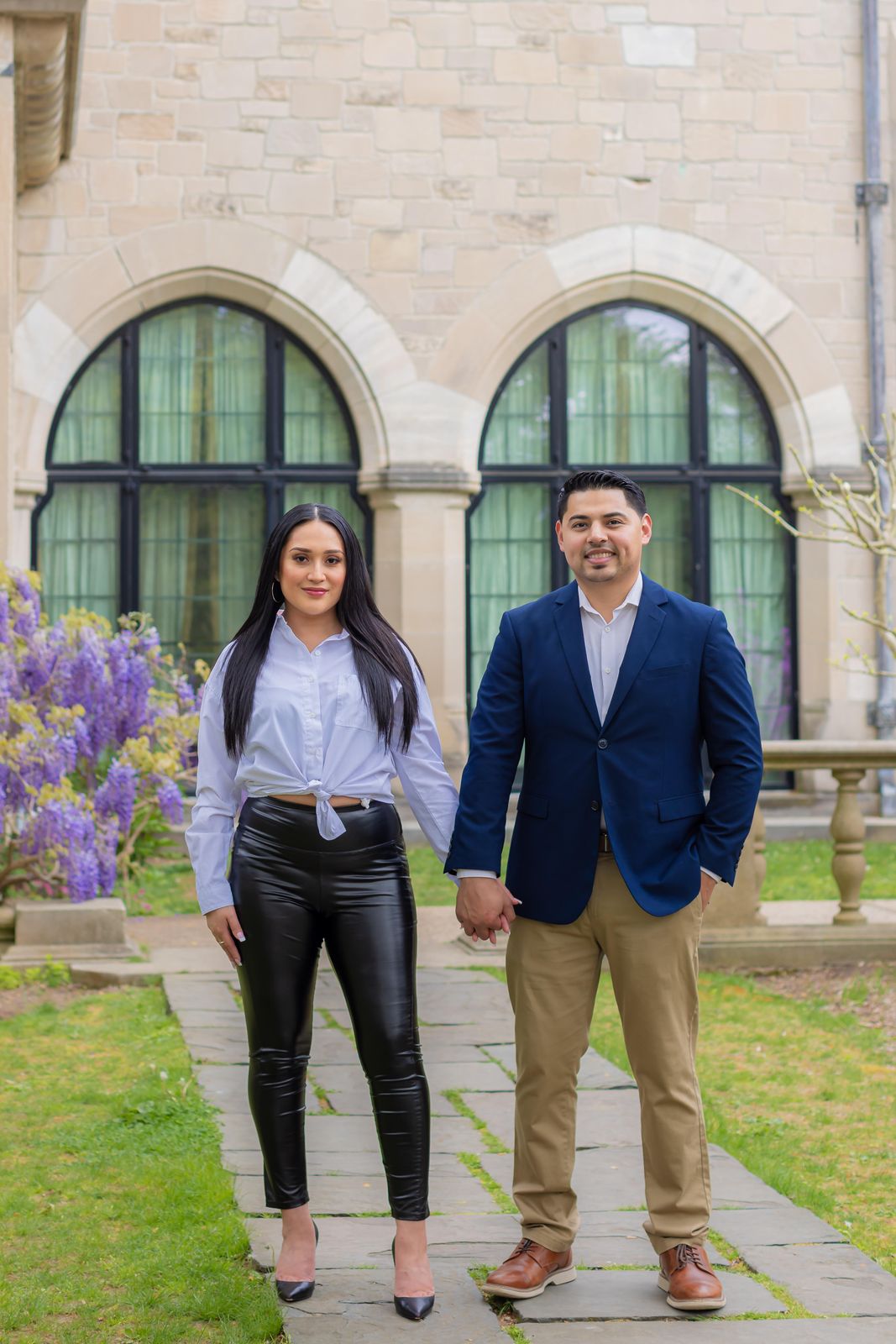 Couple holding hands outdoors. Morale Visual