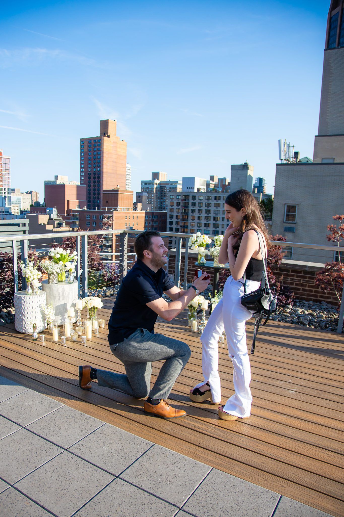 Rooftop proposal with skyline view