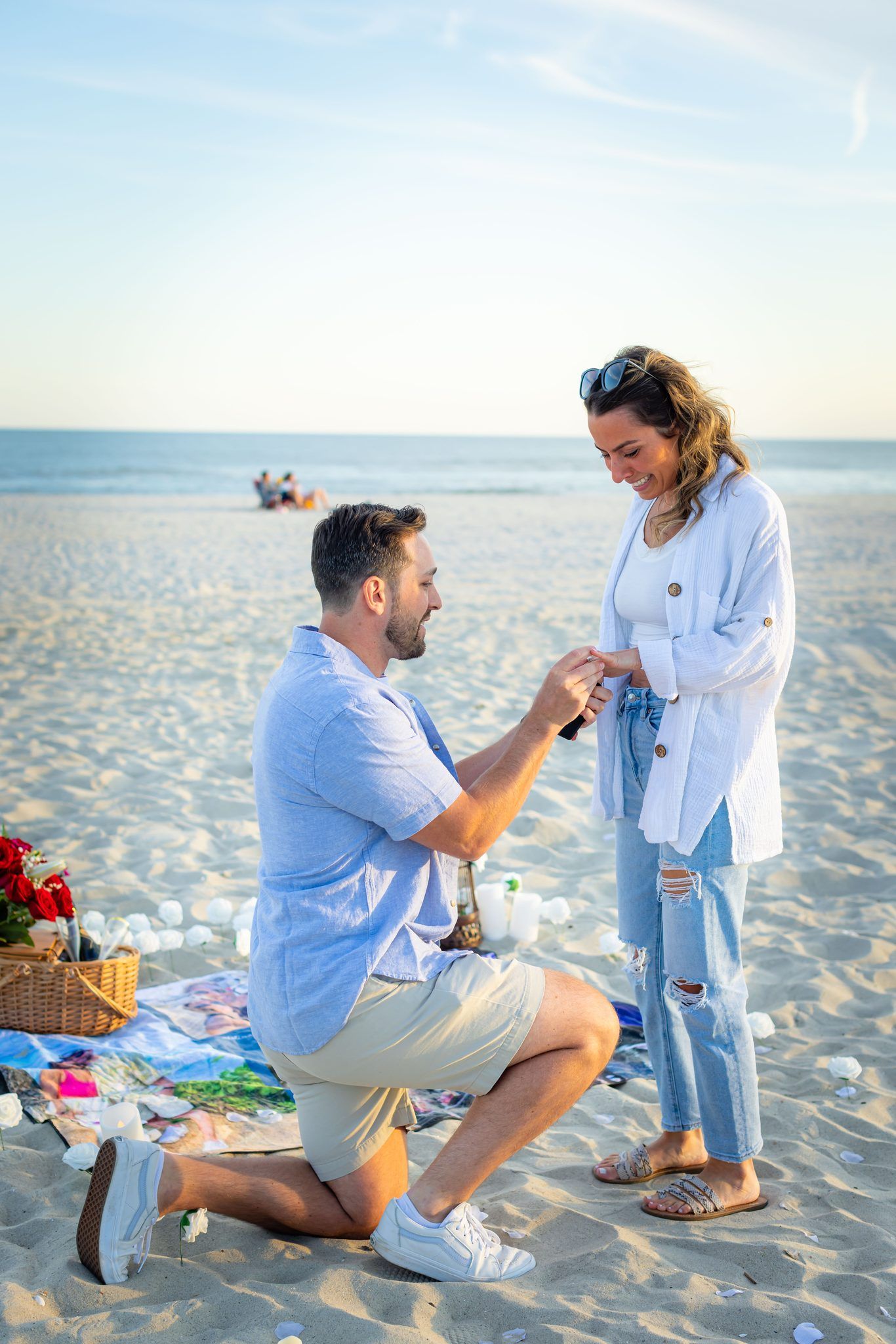 Beach proposal on one knee