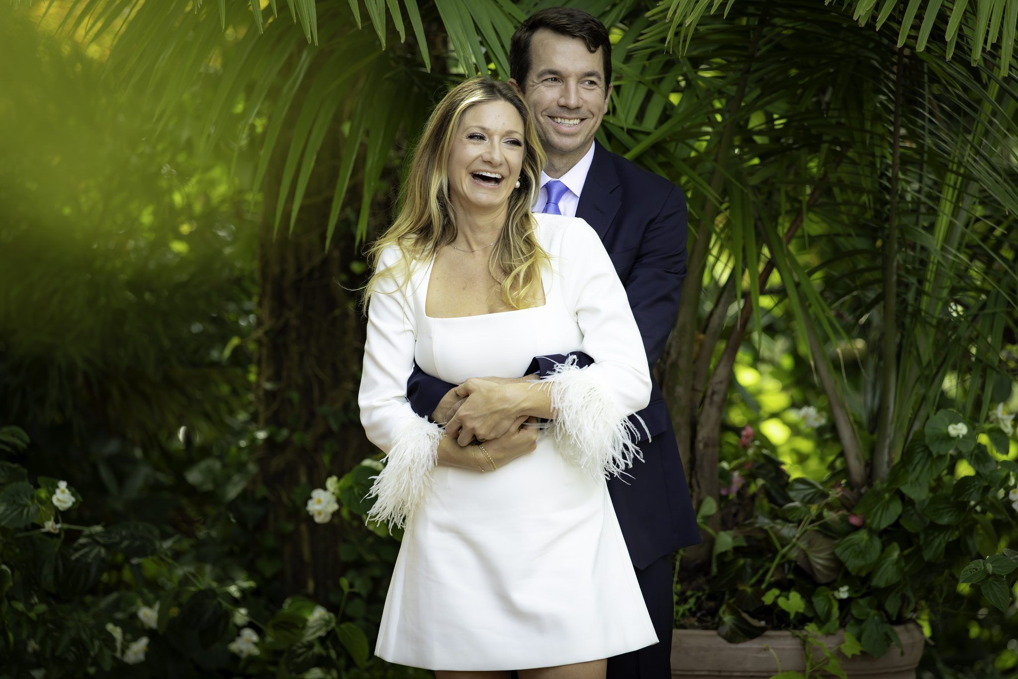 Laughing couple in a garden